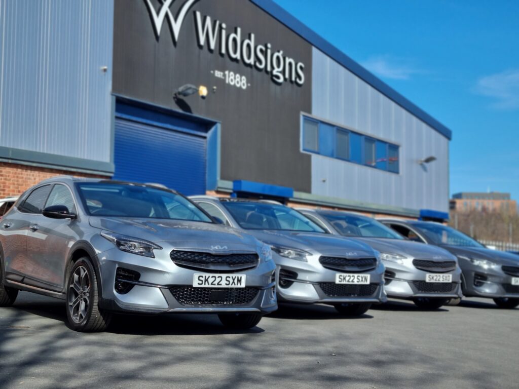 Widd Signs' hybrid and electric vehicle fleet in front of its Leeds factory