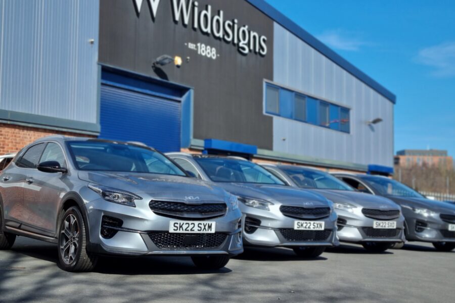 Widd Signs' hybrid and electric vehicle fleet in front of its Leeds factory